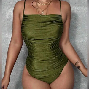 Brand new green bodysuit